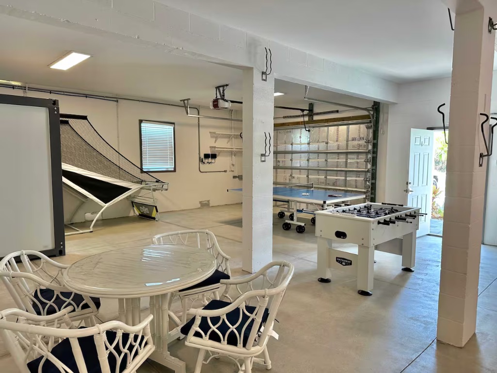 Seaside Boca game lounge with ping pong foosball and volleyball