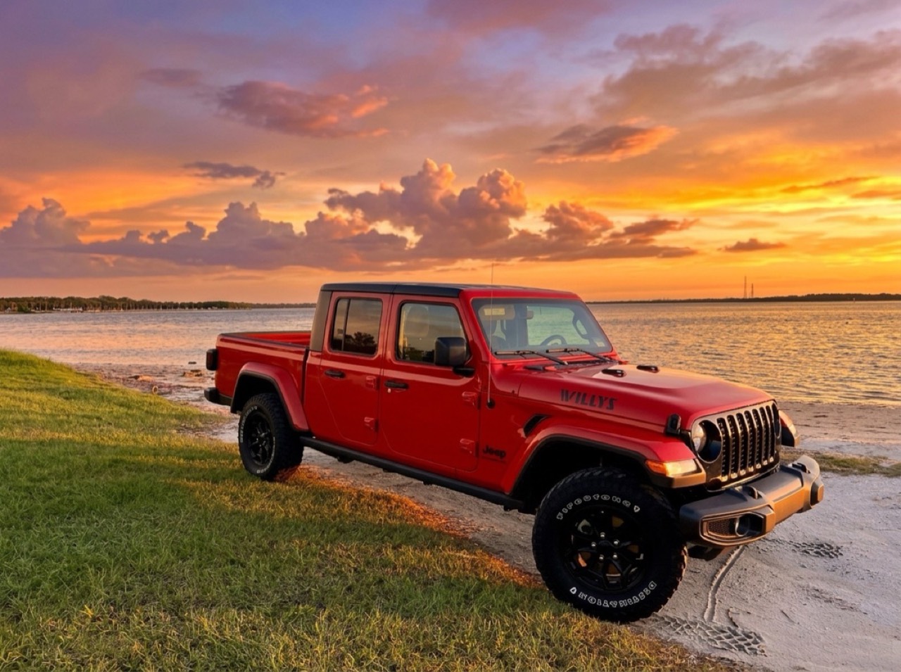 Red Jeep Gladiator Willys at Florida sunset, TravelDRD rental