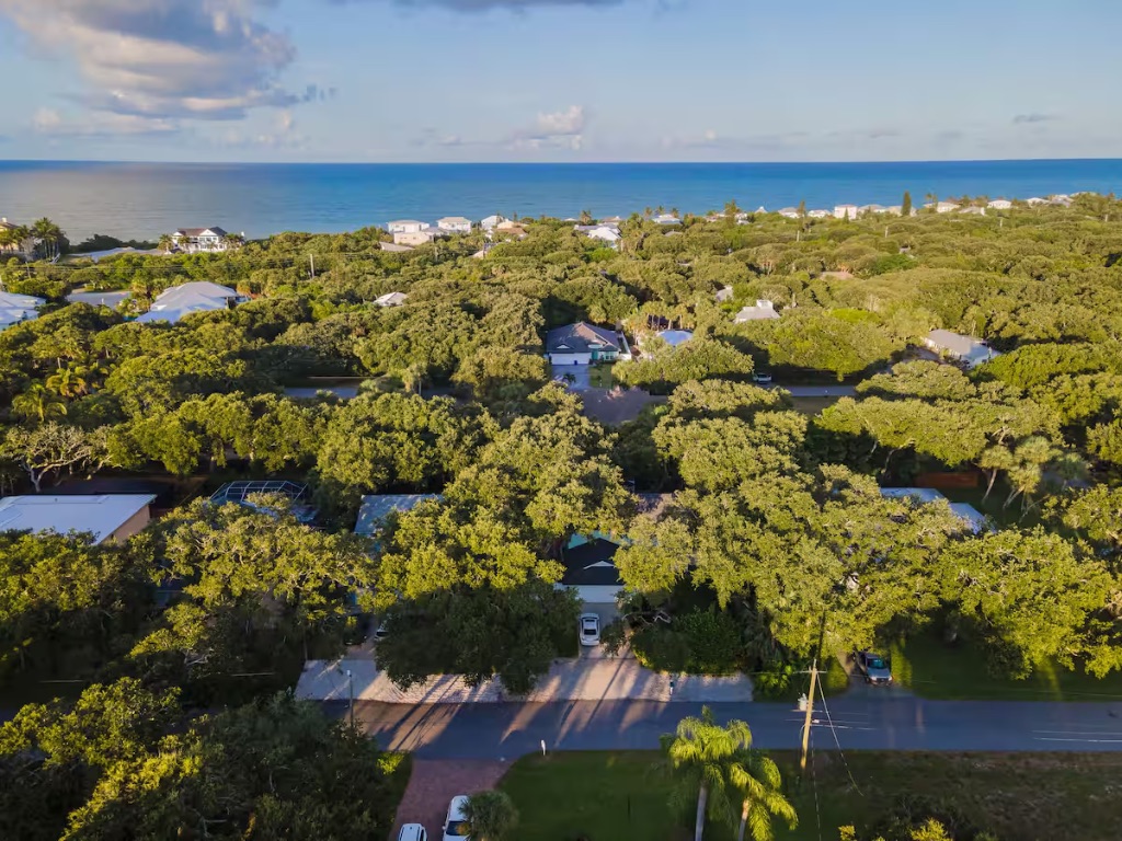 Vero Oaks aerial view showing proximity to beach and lush oak tree surroundings