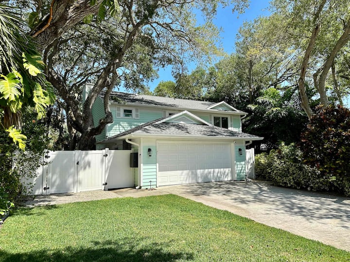Vero Oaks vacation rental exterior view with mature oak trees and outdoor amenities Vero Beach Florida